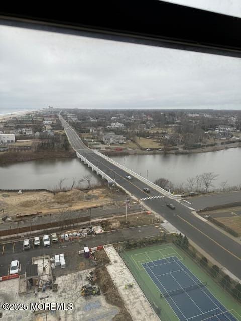 drone / aerial view featuring a water view