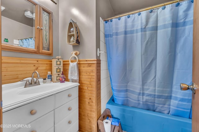 bathroom with vanity and shower / bath combination with curtain