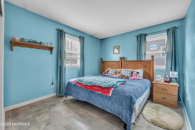 bedroom featuring baseboards