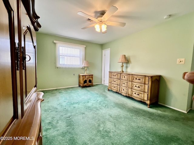 unfurnished bedroom featuring visible vents, a ceiling fan, baseboards, and carpet floors