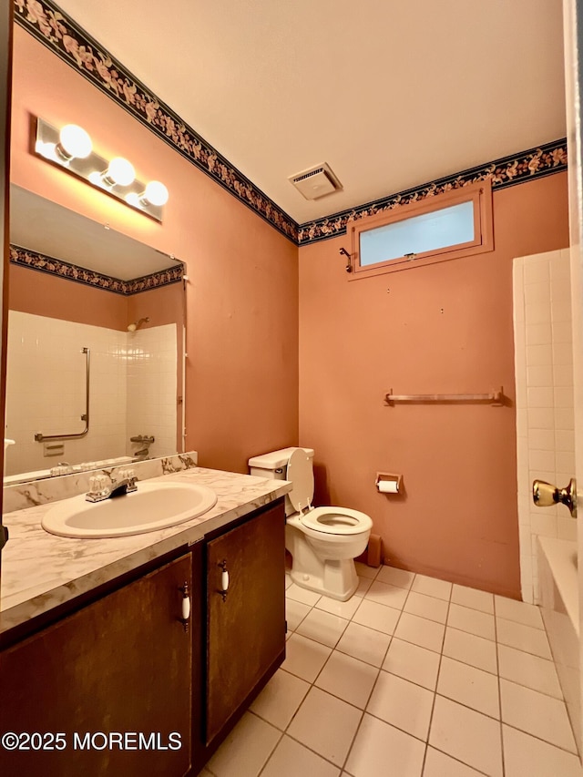 bathroom with vanity, visible vents, a shower, tile patterned floors, and toilet