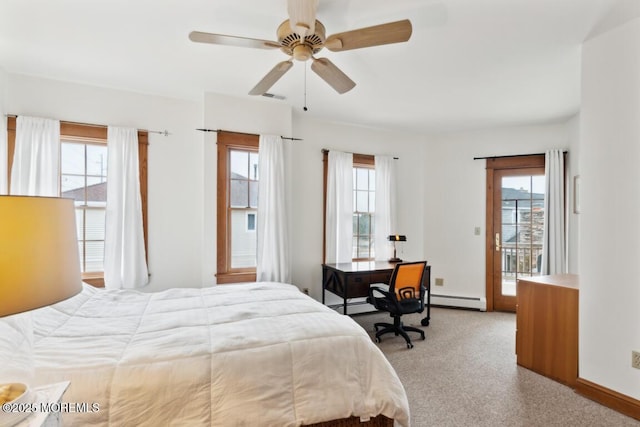 carpeted bedroom with visible vents, multiple windows, a ceiling fan, and a baseboard radiator