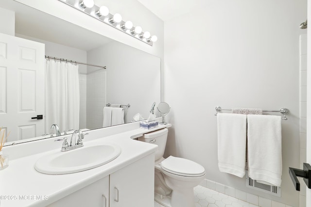 full bathroom with tile patterned flooring, visible vents, toilet, a shower with curtain, and vanity