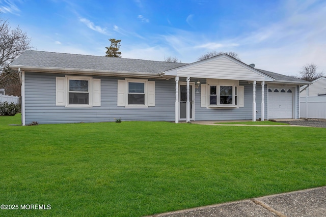 ranch-style house featuring aphalt driveway, a front lawn, a garage, and fence