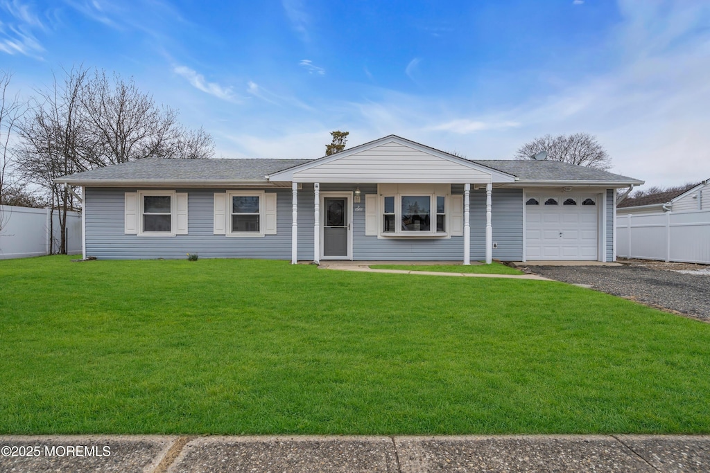 6 Omaha St, Barnegat, NJ 08005 - ranch-style house with a garage, driveway, a front yard, and fence