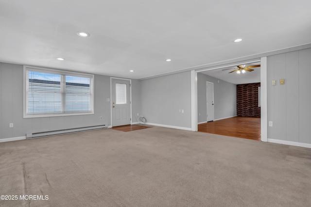 unfurnished living room with ceiling fan, baseboards, carpet, baseboard heating, and recessed lighting