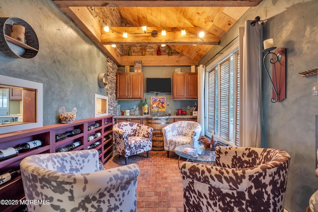 living room featuring wooden ceiling, vaulted ceiling with beams, and brick floor