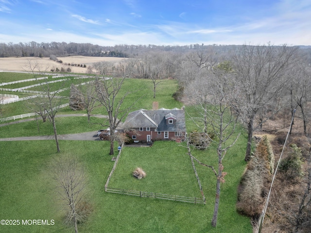 birds eye view of property with a rural view