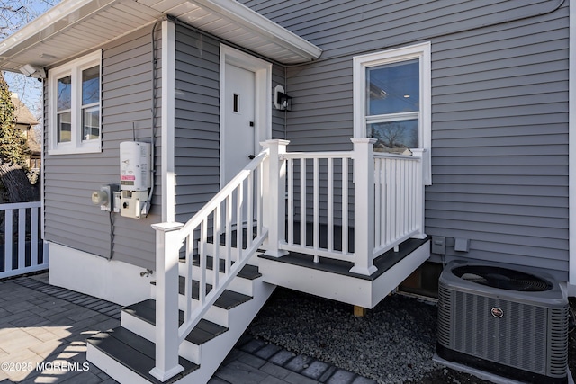 property entrance featuring central AC