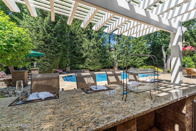 view of patio / terrace with outdoor dining space, an outdoor pool, and a pergola