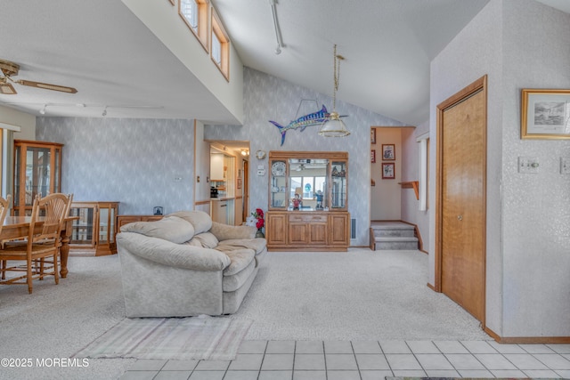 35 W Mohawk Dr, Little Egg Harbor, NJ 08087 - living room with wallpapered walls, rail lighting, light carpet, ceiling fan, and stairway
