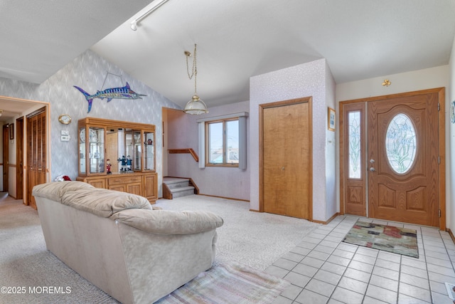 35 W Mohawk Dr, Little Egg Harbor, NJ 08087 - entrance foyer with wallpapered walls, lofted ceiling, light carpet, baseboards, and stairway