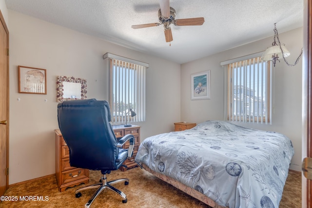 35 W Mohawk Dr, Little Egg Harbor, NJ 08087 - carpeted bedroom with a textured ceiling and a ceiling fan