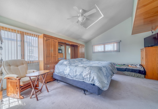 35 W Mohawk Dr, Little Egg Harbor, NJ 08087 - bedroom with light carpet, vaulted ceiling, and a ceiling fan