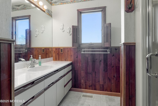 35 W Mohawk Dr, Little Egg Harbor, NJ 08087 - bathroom featuring wainscoting, vanity, wooden walls, and tile patterned floors