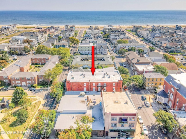 aerial view with a residential view and a water view