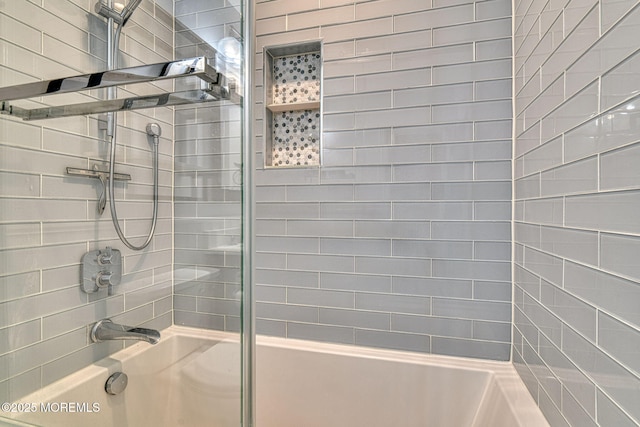 bathroom featuring washtub / shower combination