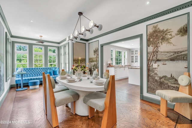 dining area with crown molding