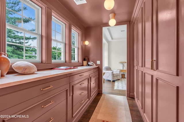 bathroom featuring visible vents and wood finished floors