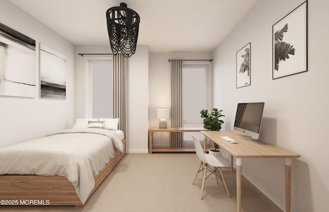 bedroom with an inviting chandelier, light colored carpet, and baseboards