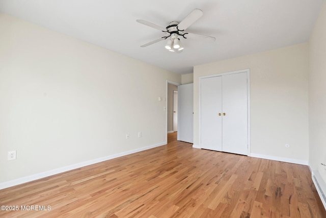 5 Island View Way Unit 3, Sea Bright, NJ 07760 - unfurnished bedroom with baseboards, a closet, light wood-style floors, and a ceiling fan
