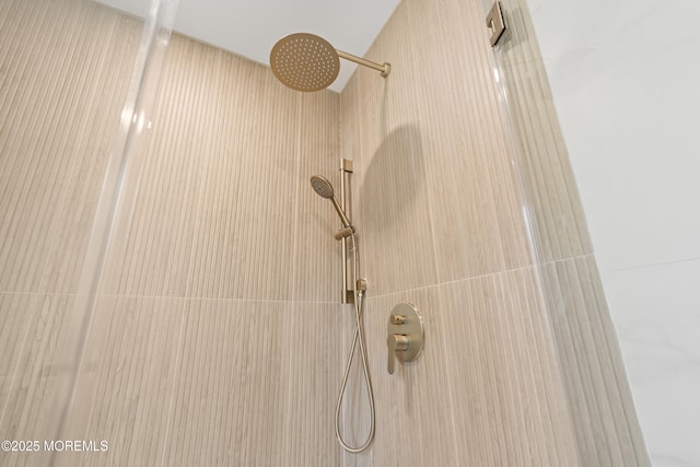 details featuring a tile shower