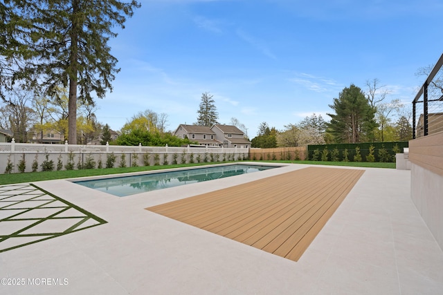 view of pool featuring a fenced in pool, a patio, a fenced backyard, and a deck