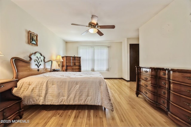 bedroom with ceiling fan and light wood-type flooring