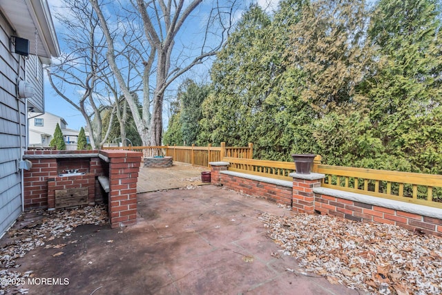 view of patio with fence