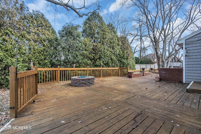 deck with an outdoor fire pit