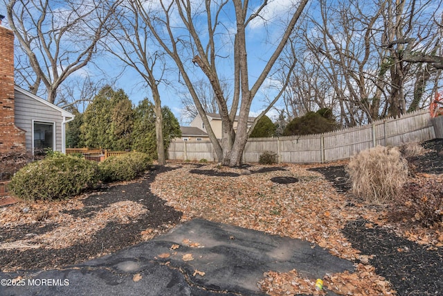 view of yard with fence