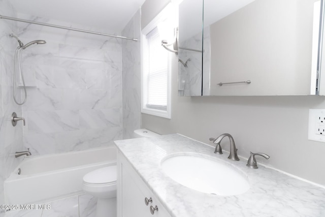 bathroom featuring vanity, shower / bathing tub combination, toilet, and marble finish floor