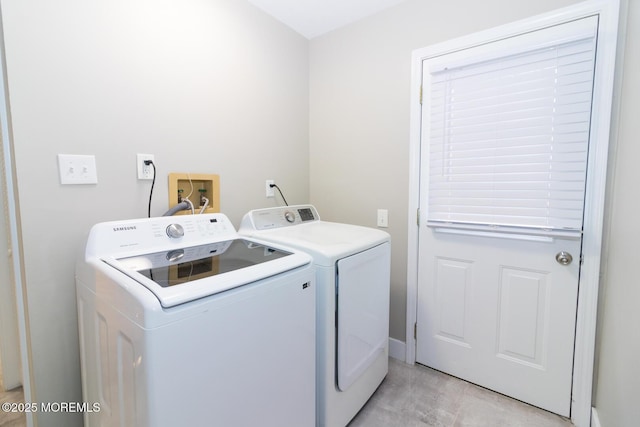 laundry room featuring laundry area and separate washer and dryer