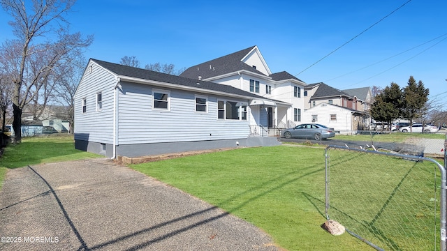 view of front of house with a front lawn