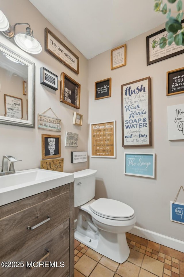 144 Brandywine Ct Unit 332, Brick, NJ 08724 - bathroom with baseboards, toilet, and vanity