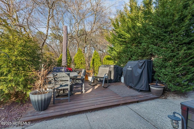 144 Brandywine Ct Unit 332, Brick, NJ 08724 - wooden deck featuring outdoor dining space and grilling area