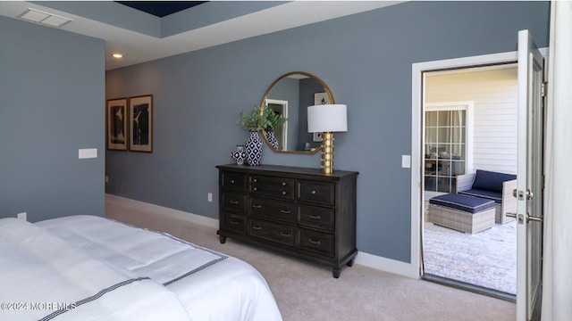 bedroom with carpet flooring, visible vents, and baseboards