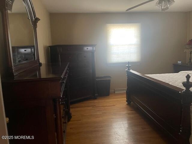 bedroom with light wood-style flooring