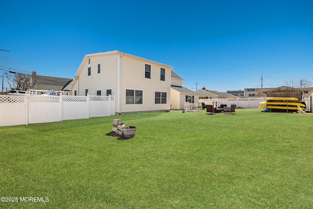 view of yard with a fenced backyard