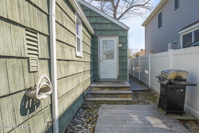 property entrance featuring fence