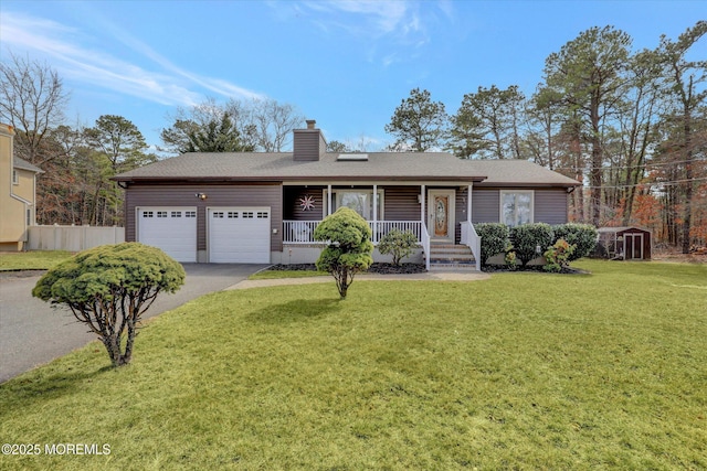 1500 First Ave, Toms River, NJ 08757 - ranch-style home with a front lawn, aphalt driveway, a porch, a chimney, and a garage