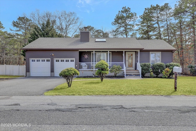 1500 First Ave, Toms River, NJ 08757 - ranch-style home featuring a front yard, driveway, covered porch, a chimney, and a garage