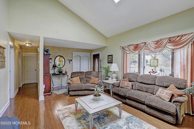 1500 First Ave, Toms River, NJ 08757 - living room with baseboards, high vaulted ceiling, and wood finished floors