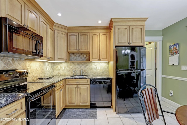 1500 First Ave, Toms River, NJ 08757 - kitchen with light brown cabinets, light tile patterned floors, stone counters, decorative backsplash, and black appliances