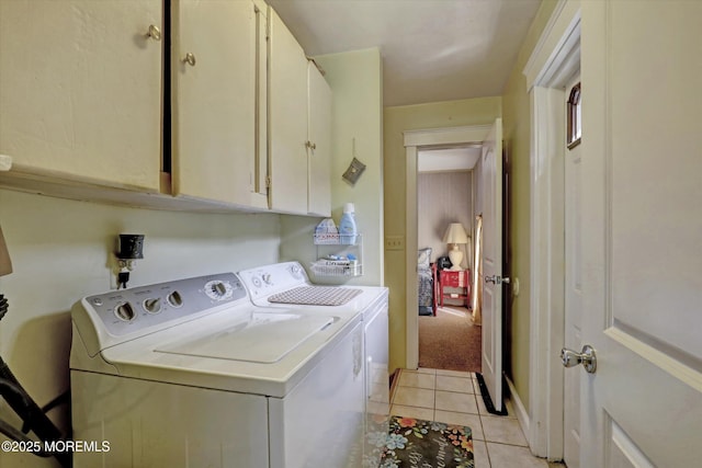 1500 First Ave, Toms River, NJ 08757 - clothes washing area with light tile patterned floors, cabinet space, and washing machine and clothes dryer
