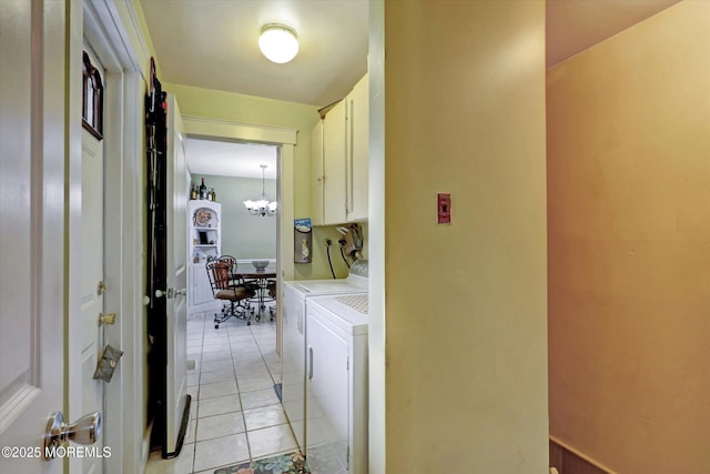 1500 First Ave, Toms River, NJ 08757 - laundry room featuring a notable chandelier, light tile patterned flooring, cabinet space, and washer and clothes dryer