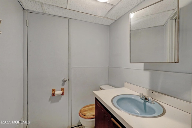 1500 First Ave, Toms River, NJ 08757 - bathroom with vanity, toilet, and a paneled ceiling