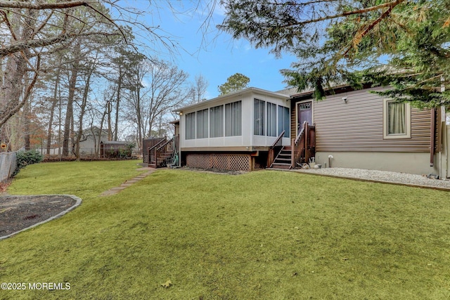 1500 First Ave, Toms River, NJ 08757 - rear view of property with a yard, stairs, a fenced backyard, and a sunroom