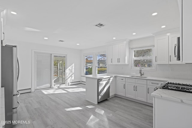 1 Redlands Ct, Toms River, NJ 08757 - kitchen with visible vents, backsplash, stainless steel appliances, and a sink