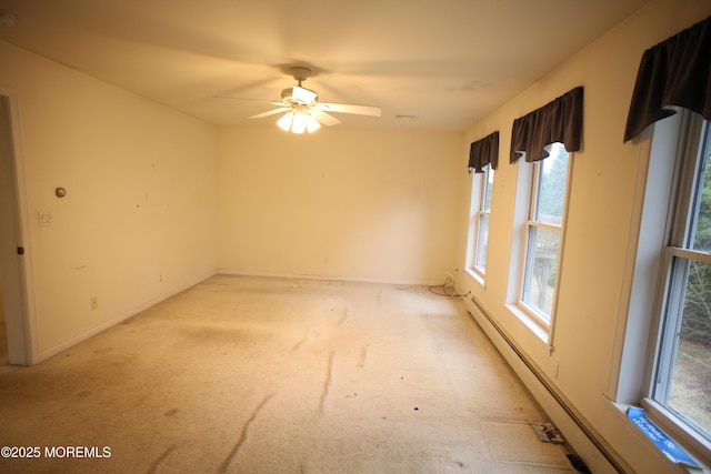 16 Ensor Pl, Island Heights, NJ 08732 - unfurnished room featuring a baseboard heating unit, plenty of natural light, ceiling fan, and light colored carpet